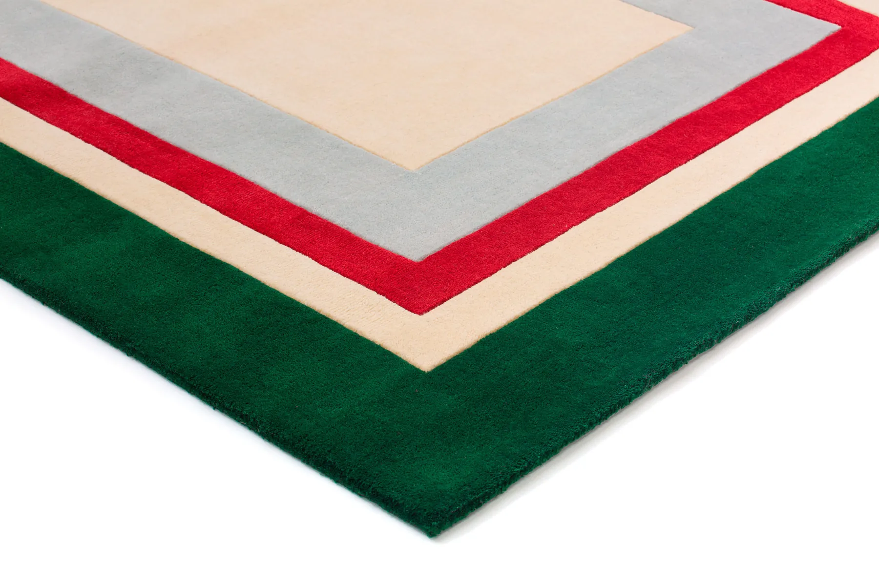 Photo de détail d’un tapis à bordures colorées